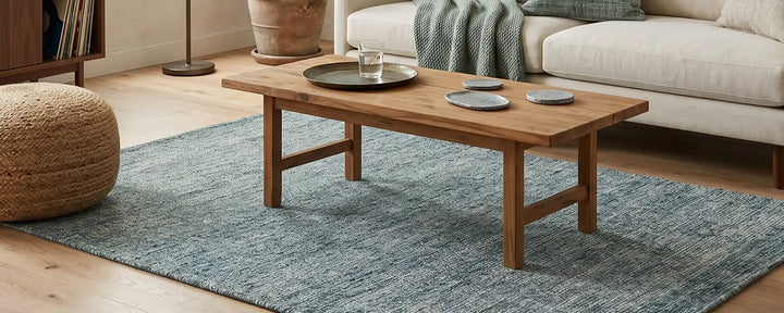 Groen vloerkleed op de homepagina van vloerkledenactie.nl om te verwijzen naar onze best effen vloerkleden