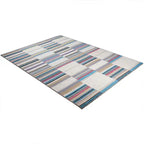 Diagonaal aanzicht van het vloerkleed BELLFORD in de kleur Turquoise, gemaakt van 100% Wol.