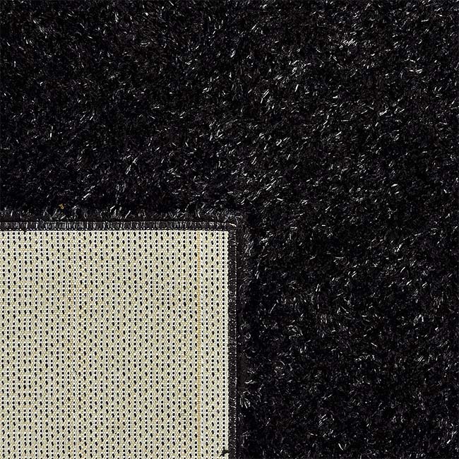 Achterkant hoek aanzicht van het vloerkleed BRAVON in de kleur Antraciet, gemaakt van Polyester.