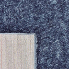 Achterkant hoek aanzicht van het vloerkleed BRAVON in de kleur Blauw, gemaakt van Polyester.