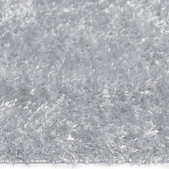 Zijkant detail aanzicht van het vloerkleed BRAVON in de kleur Grijs, gemaakt van Polyester.