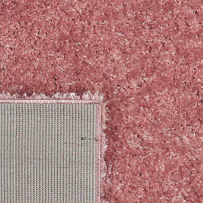 Achterkant hoek aanzicht van het vloerkleed BRAVON in de kleur Roze, gemaakt van Polyester.