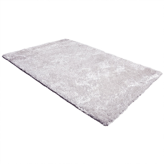 Diagonaal aanzicht van het vloerkleed BRAVON in de kleur Wit, gemaakt van Polyester.