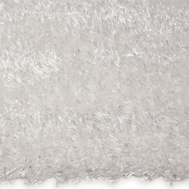 Zijkant detail aanzicht van het vloerkleed BRAVON in de kleur Wit, gemaakt van Polyester.