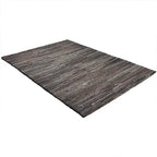 Diagonaal aanzicht van het vloerkleed CALLUM in de kleuren Bruin / Roest, gemaakt van 100% Wol.