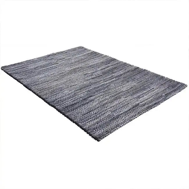 Diagonaal aanzicht van het vloerkleed CRESSON in de kleuren Bruin / Blauw, gemaakt van 100% Wol.