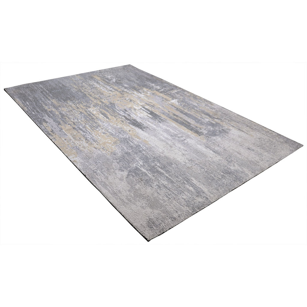 Diagonaal aanzicht van het vloerkleed CYLOR in de kleuren Goud / Grijs, gemaakt van Polyester.