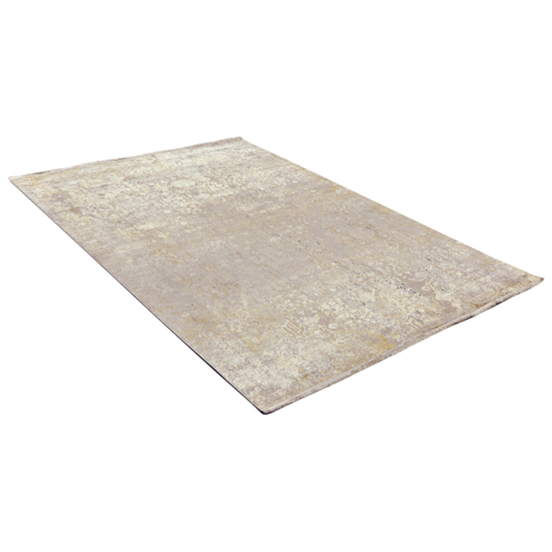 Diagonaal aanzicht van het vloerkleed DAREON in de kleur Beige, gemaakt van Polyester.