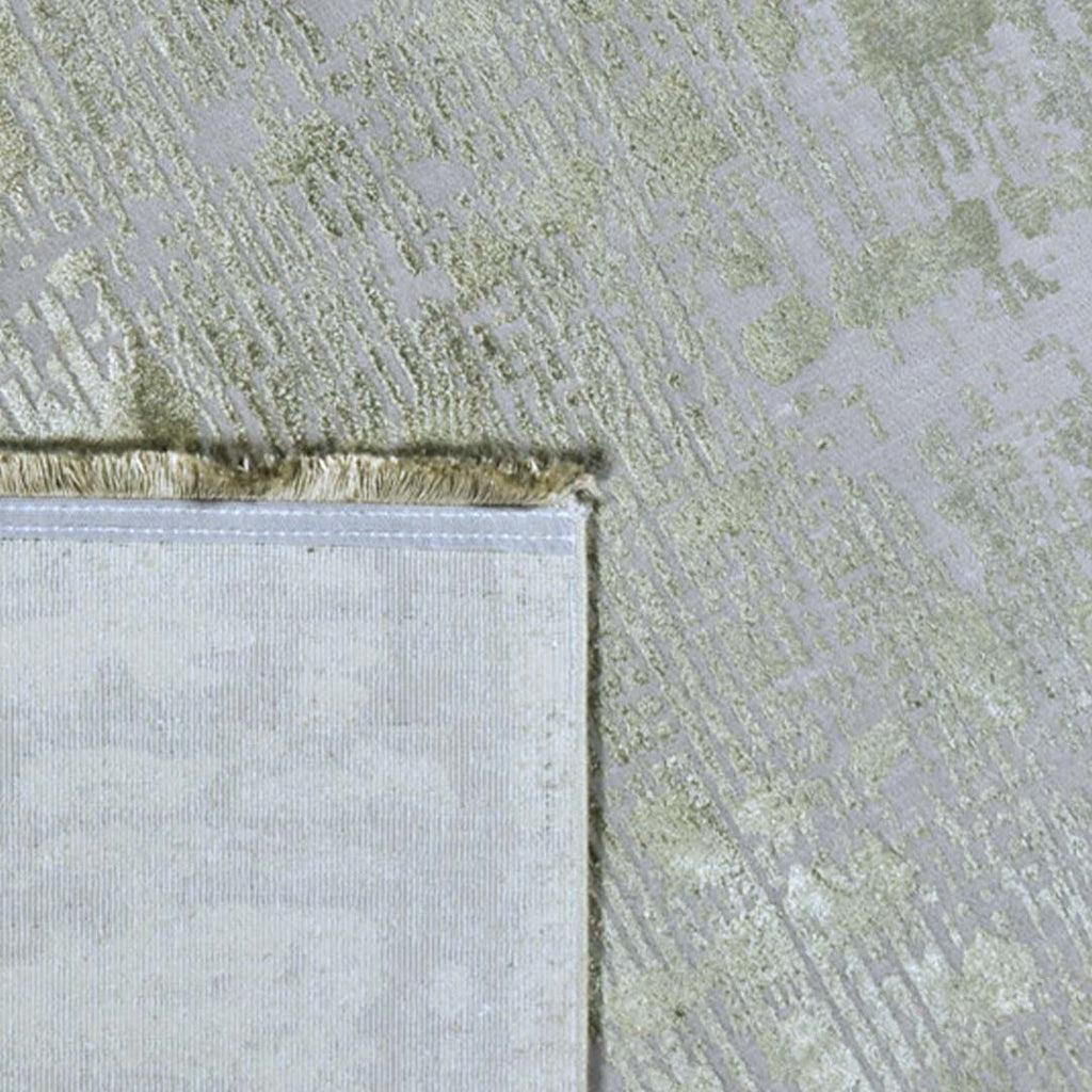 Achterkant hoek aanzicht van het vloerkleed DAREON in de kleur Groen, gemaakt van Polyester.