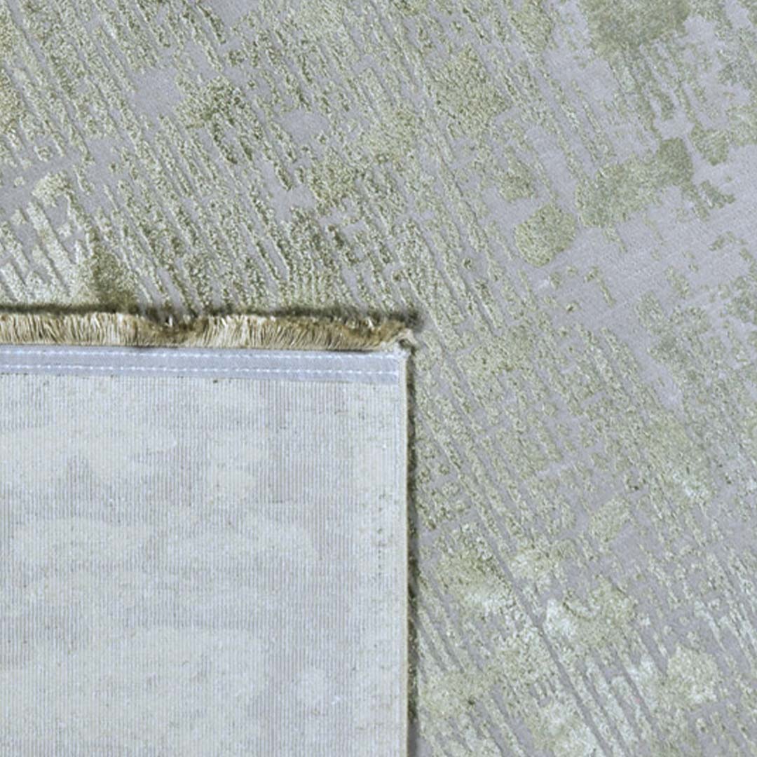 Achterkant hoek aanzicht van het vloerkleed DAREON in de kleur Groen, gemaakt van Polyester.