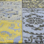 Zijkant detail aanzicht van het vloerkleed DARIEN in de kleuren Geel / Grijs, gemaakt van Katoen.