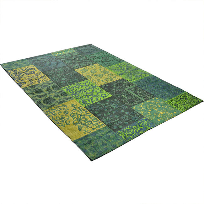 Diagonaal aanzicht van het vloerkleed DARIEN in de kleur Groen, gemaakt van Katoen.