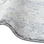 Zijkant detail aanzicht van het vloerkleed DRAVEN in de kleuren Creme / Grijs, gemaakt van Polyester.