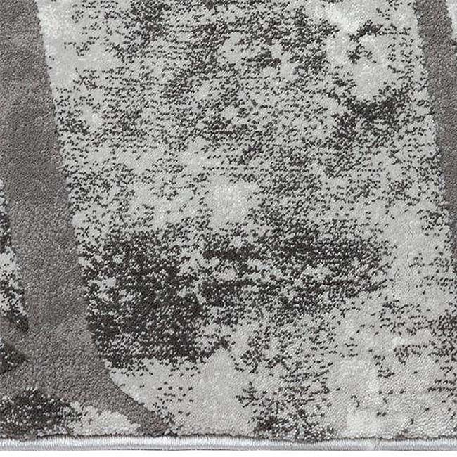 Zijkant detail aanzicht van het vloerkleed DRAVEN in de kleur Grijs, gemaakt van Polyester.