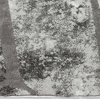 Zijkant detail aanzicht van het vloerkleed DRAVEN in de kleur Grijs, gemaakt van Polyester.