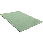 Diagonaal aanzicht van het vloerkleed GARON HEXAGON in de kleuren Mint / Groen, gemaakt van 100% Wol.