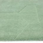 Zijkant detail aanzicht van het vloerkleed GARON HEXAGON in de kleuren Mint / Groen, gemaakt van 100% Wol.