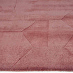 Zijkant detail aanzicht van het vloerkleed GARON HEXAGON in de kleur Roze, gemaakt van 100% Wol.