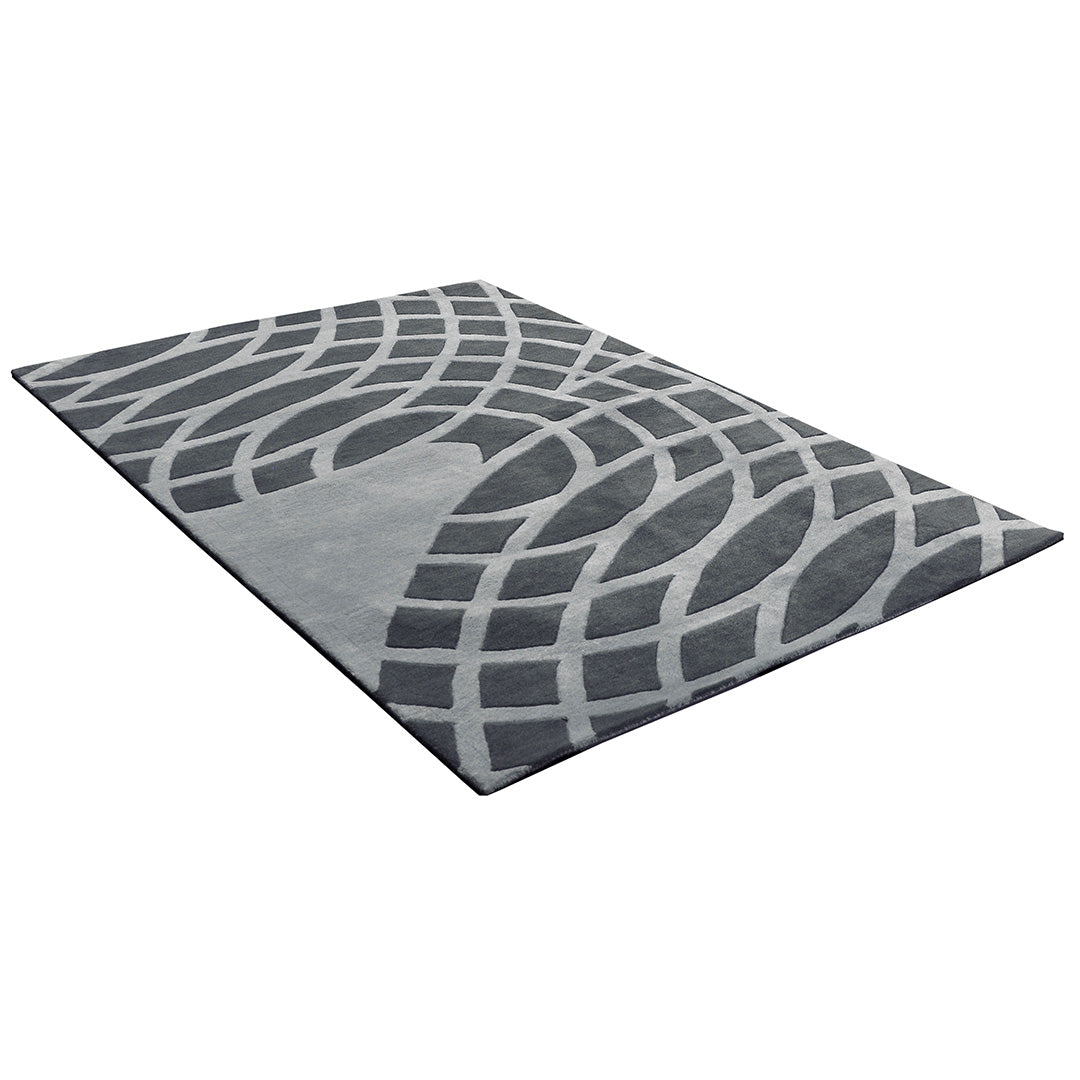 Diagonaal aanzicht van het vloerkleed GARON INCA in de kleur Grijs, gemaakt van 100% Wol.