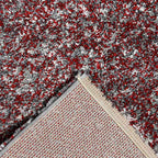 Achterkant hoek aanzicht van het vloerkleed HALVOR Klein in de kleur Rood, gemaakt van Polyester.
