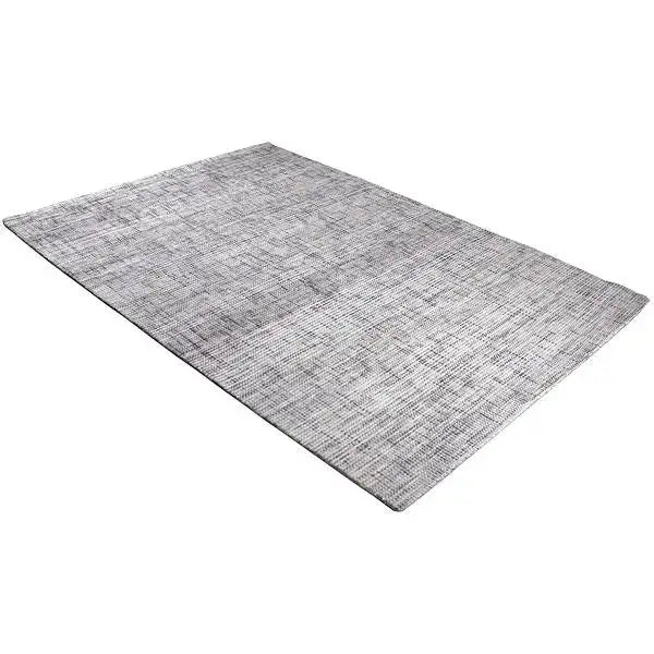 Diagonaal aanzicht van het vloerkleed HARLEN in de kleur Beige, gemaakt van Wol en Polyester mix.