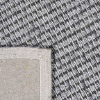 Achterkant hoek aanzicht van het vloerkleed HUXLEY in de kleur Zilver, gemaakt van Wol en Viscose mix.
