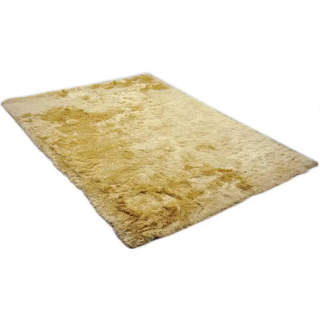 Diagonaal aanzicht van het vloerkleed INDIRA in de kleur Beige, gemaakt van Polyester.