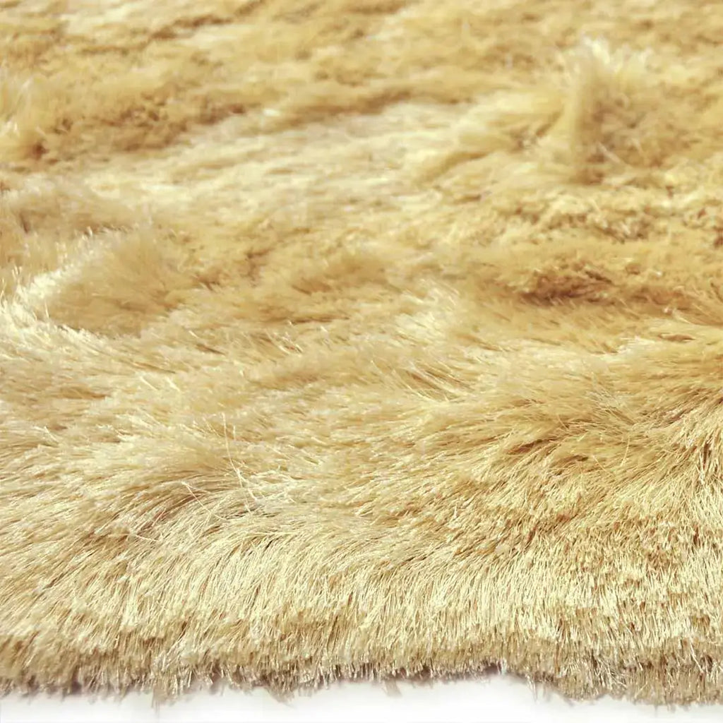 Zijkant detail aanzicht van het vloerkleed INDIRA in de kleur Beige, gemaakt van Polyester.