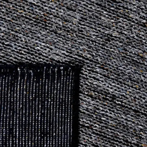 Achterkant hoek aanzicht van het vloerkleed LARETH in de kleuren Aqua / Blauw, gemaakt van Wol mix.