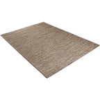 Diagonaal aanzicht van het vloerkleed LYDEN in de kleur Bruin, gemaakt van Katoen.