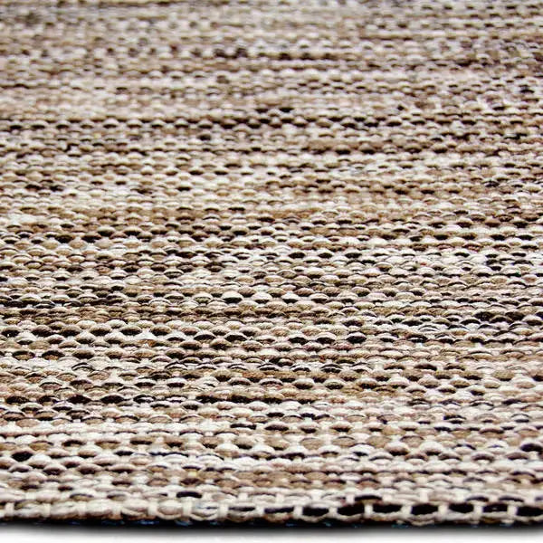 Zijkant detail aanzicht van het vloerkleed LYDEN in de kleur Bruin, gemaakt van Katoen.