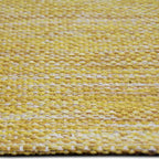 Zijkant detail aanzicht van het vloerkleed LYDEN in de kleuren Goud / Geel, gemaakt van Katoen.