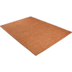 Diagonaal aanzicht van het vloerkleed LYDEN in de kleur Oranje, gemaakt van Katoen.