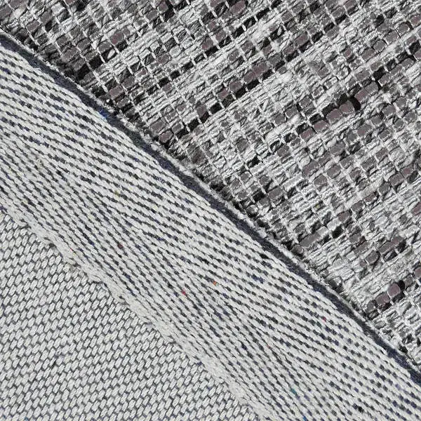 Achterkant hoek aanzicht van het vloerkleed MAREK Rond in de kleur Taupe, gemaakt van Polyester en Nylon mix.