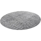 Diagonaal aanzicht van het vloerkleed MAREK Rond in de kleur Taupe, gemaakt van Polyester en Nylon mix.