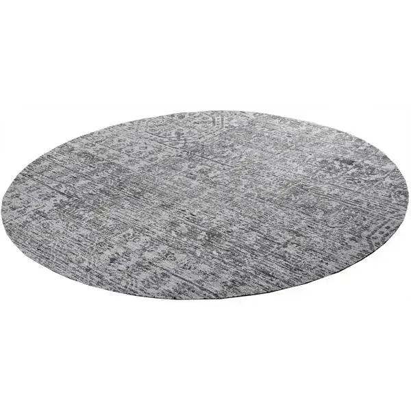Diagonaal aanzicht van het vloerkleed MAREK Rond in de kleur Taupe, gemaakt van Polyester en Nylon mix.