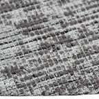 Zijkant detail aanzicht van het vloerkleed MAREK Rond in de kleur Taupe, gemaakt van Polyester en Nylon mix.