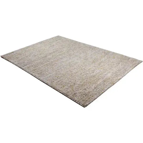 Diagonaal aanzicht van het vloerkleed MIRANDE in de kleuren Beige / Bruin, gemaakt van 100% wol.