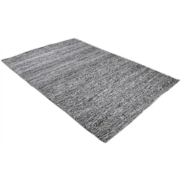 Diagonaal aanzicht van het vloerkleed MORDANA in de kleur Bruin, gemaakt van Wol en Polyester mix.