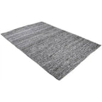 Diagonaal aanzicht van het vloerkleed MORDANA in de kleur Bruin, gemaakt van Wol en Polyester mix.