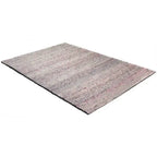Diagonaal aanzicht van het vloerkleed NARETH in de kleuren Naturel / Beige / Roze, gemaakt van 100% Wol.