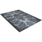 Diagonaal aanzicht van het vloerkleed NEXON in de kleur Grijs, gemaakt van Polyester.