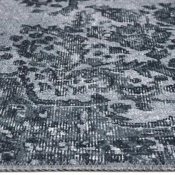 Zijkant detail aanzicht van het vloerkleed NEXON in de kleur Grijs, gemaakt van Polyester.