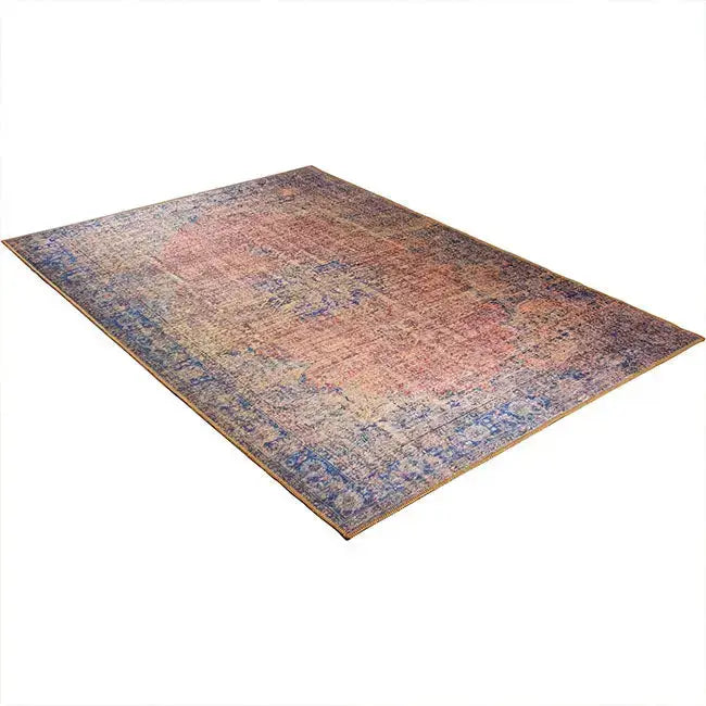 Diagonaal aanzicht van het vloerkleed NEXON konya in de kleuren Rood / Oranje / Blauw, gemaakt van Polyester.