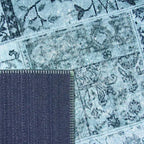 Achterkant hoek aanzicht van het vloerkleed NEXON patch in de kleur Blauw, gemaakt van Polyester.