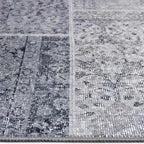 Zijkant detail aanzicht van het vloerkleed NEXON patch in de kleur Grijs, gemaakt van Polyester.