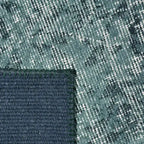 Achterkant hoek aanzicht van het vloerkleed NEXON patch in de kleur Groen, gemaakt van Polyester.