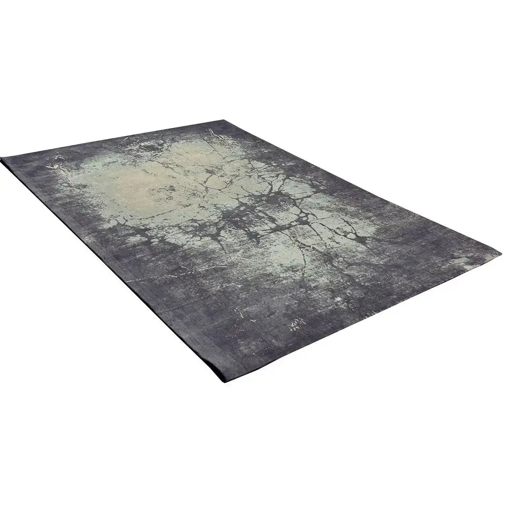 Diagonaal aanzicht van het vloerkleed ORIVON in de kleuren Groen / Grijs, gemaakt van Katoen.