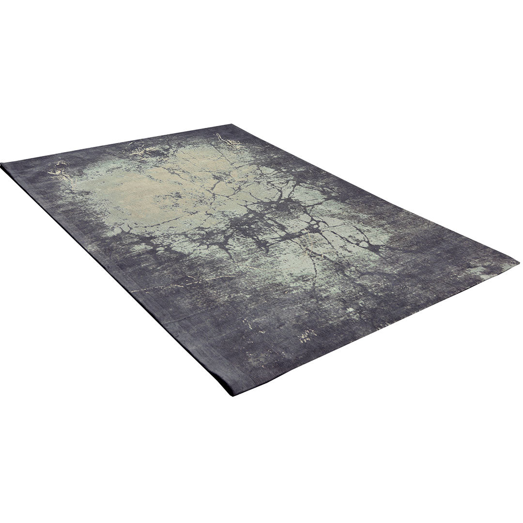 Diagonaal aanzicht van het vloerkleed ORIVON in de kleuren Groen / Grijs, gemaakt van Katoen.