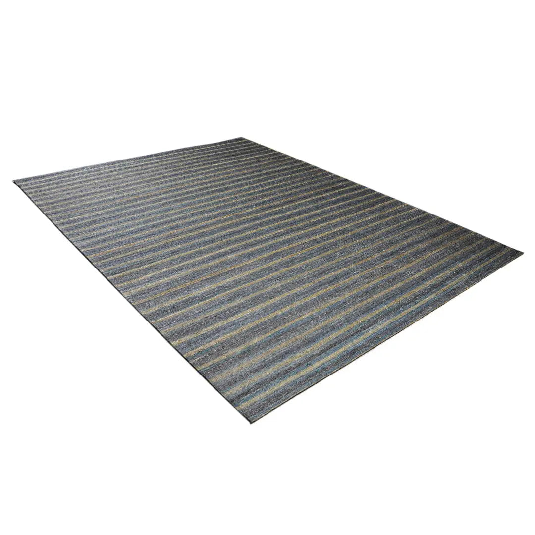 Diagonaal aanzicht van het vloerkleed RALDER in de kleuren Multikleurig / Goud / Grijs, gemaakt van Katoen.